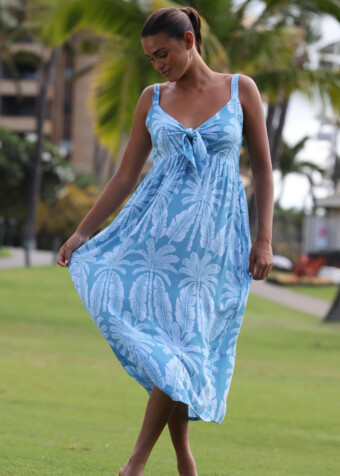 Blue royal palms strapped sundress ties in the front with elastic back.