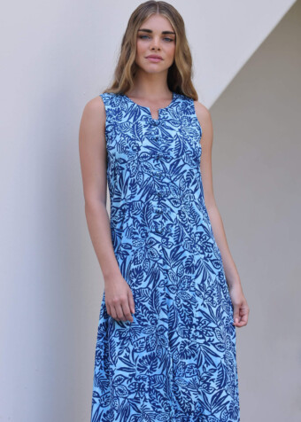 Hand tied frog buttons decorate the front of this dress to give it an Asian flair.