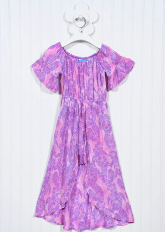 A long pretty skirt drapes over the shorts and the attached bodice features an elastic neckline for easy wearing. 