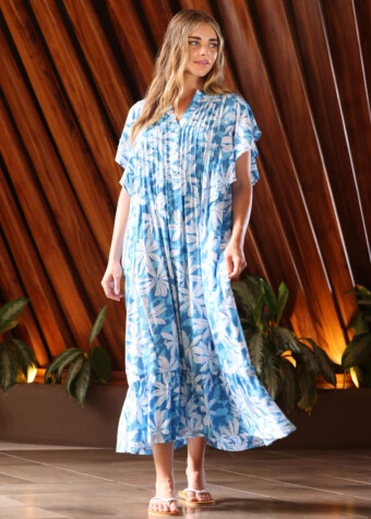 The Ruffle Muu is made of rayon. Measures approximately 45 inches from shoulder to hem.