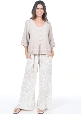 These comfortable pants offer a style characterized by wide, flowing legs that creates a dramatic, elegant silhouette. Paired here with our v button top.